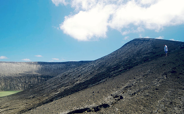 The new volcanic island formed after ash and acid rain fell within 10km of the eruption.
