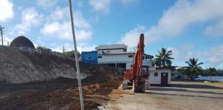 Fire-damaged buildings in Neiafu pulled down as clean up campaign starts