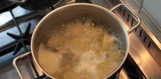 Woman charged after pouring hot dripping on de facto partner
