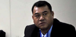 Police minister pays off TP$120,000 court debts as he faces new party supporting his rival