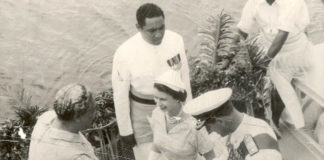 Queen Elizabeth jokes about struggling to sit cross-legged on her 1953 Tonga visit