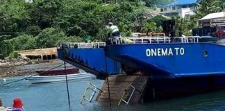 MV Onemato’s ramp seen open and hanging in water near Nāfanua wharf; details still unclear