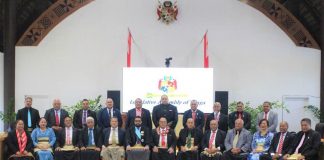 Coronavirus: Social distancing measures breached as Parliamentarians sit and stand close together
