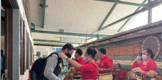 Joy at Tonga airport as first visitors arrive after 28-month ban