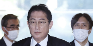 Japan to consider downgrading Covid-19 to less serious infectious disease