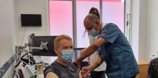 Prime Minister gets flu and Covid vaccinations at community event