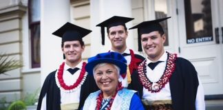 Born within minutes of each other, graduating on the same day