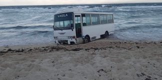 Passenger minibus stuck in ocean at Tongatapu beach removed