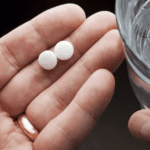 pills-with-glass-of-water-medication-headache-medicine-CPT4ZBJGQRHORBNO5KHWCNVAFA copy