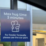 4KHYZJQ_hug_sign_jpg