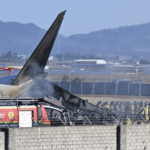 firefighters-and-rescue-team-members-work-on-the-runway-of-m-T52UXHC6RZCT5LJJDDIXH2RLJM copy