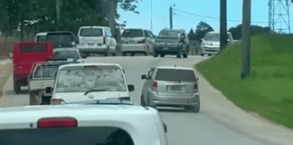 Car overtaking on wrong side near-miss with oncoming vehicles on Tonga road