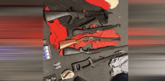 Gang members charged after cache of guns found at Auckland property