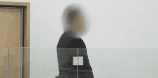 Second person in court over alleged mishandling of burials