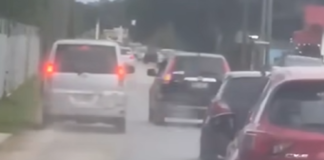 Dangerous overtaking maneuver sparks outrage after near-miss collision