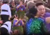 Police escort woman away after kissing Princess Pilolevu during new church celebration performance