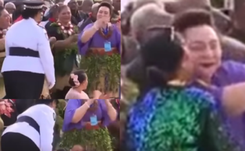 Police escort woman away after kissing Princess Pilolevu during new church celebration performance