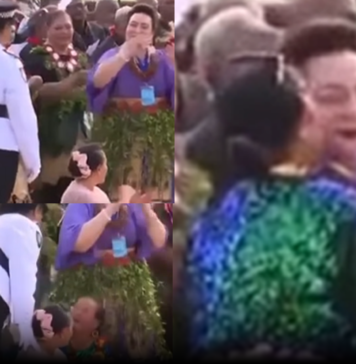 Police escort woman away after kissing Princess Pilolevu during new church celebration performance